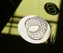 wooden model of villarceau circles with shadow